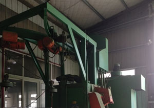 濟南歷下區拋丸機案例，型號為Q376雙掛鉤式打砂機
